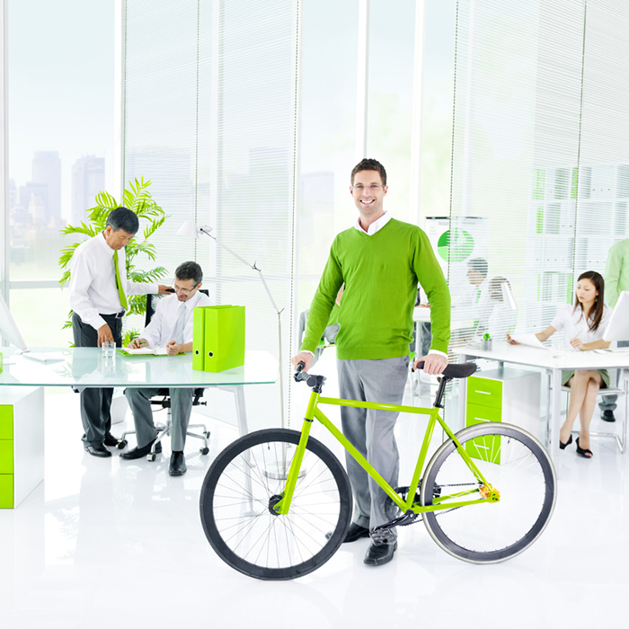Multi-ethnic group of business people in Green concept